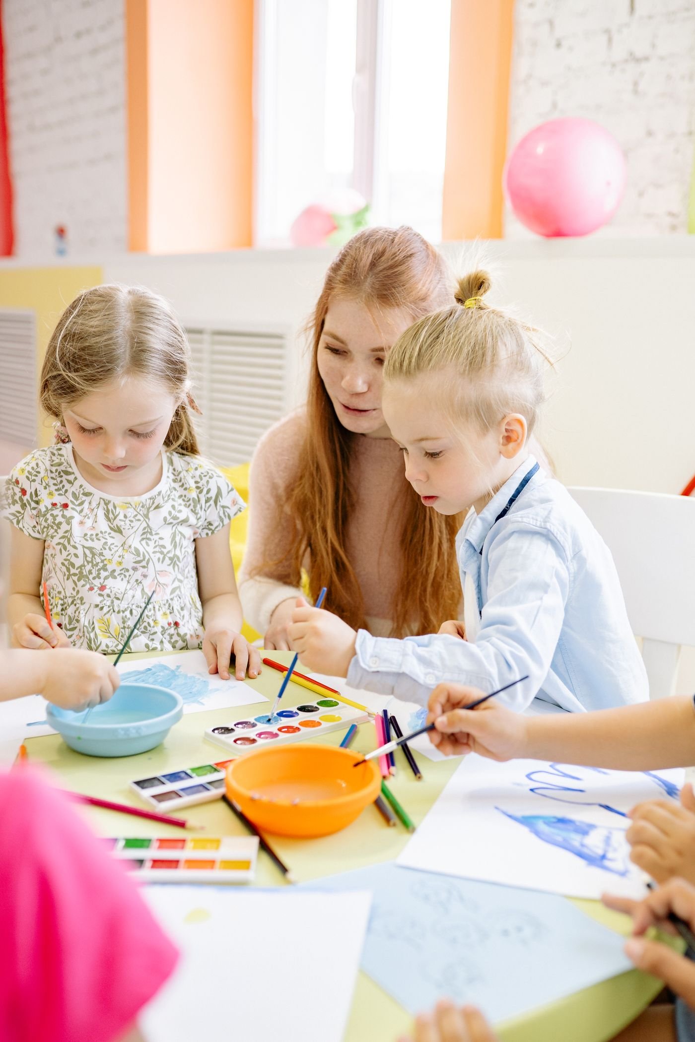 Children engaged in a creative art activity during after-school enrichment